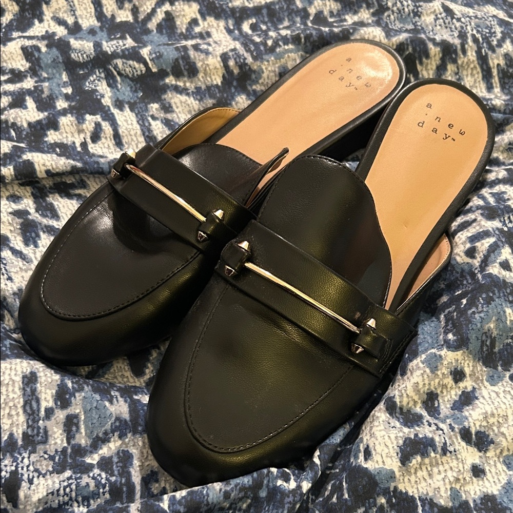 a new day Black Mules with Gold Detail